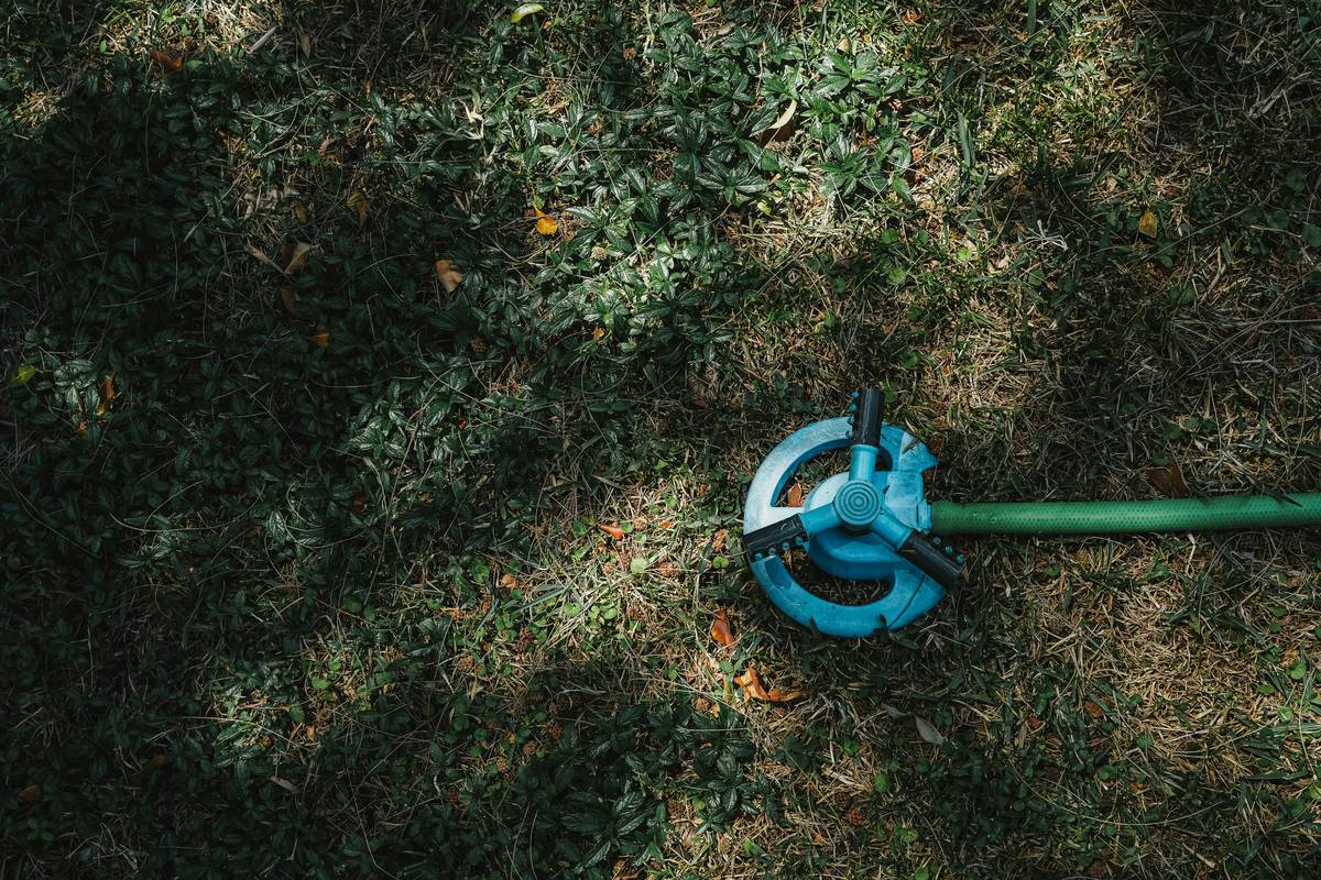 Assorted high-quality hose nozzle accessories including metal spray nozzles, quick-connect fittings, and pressure regulators